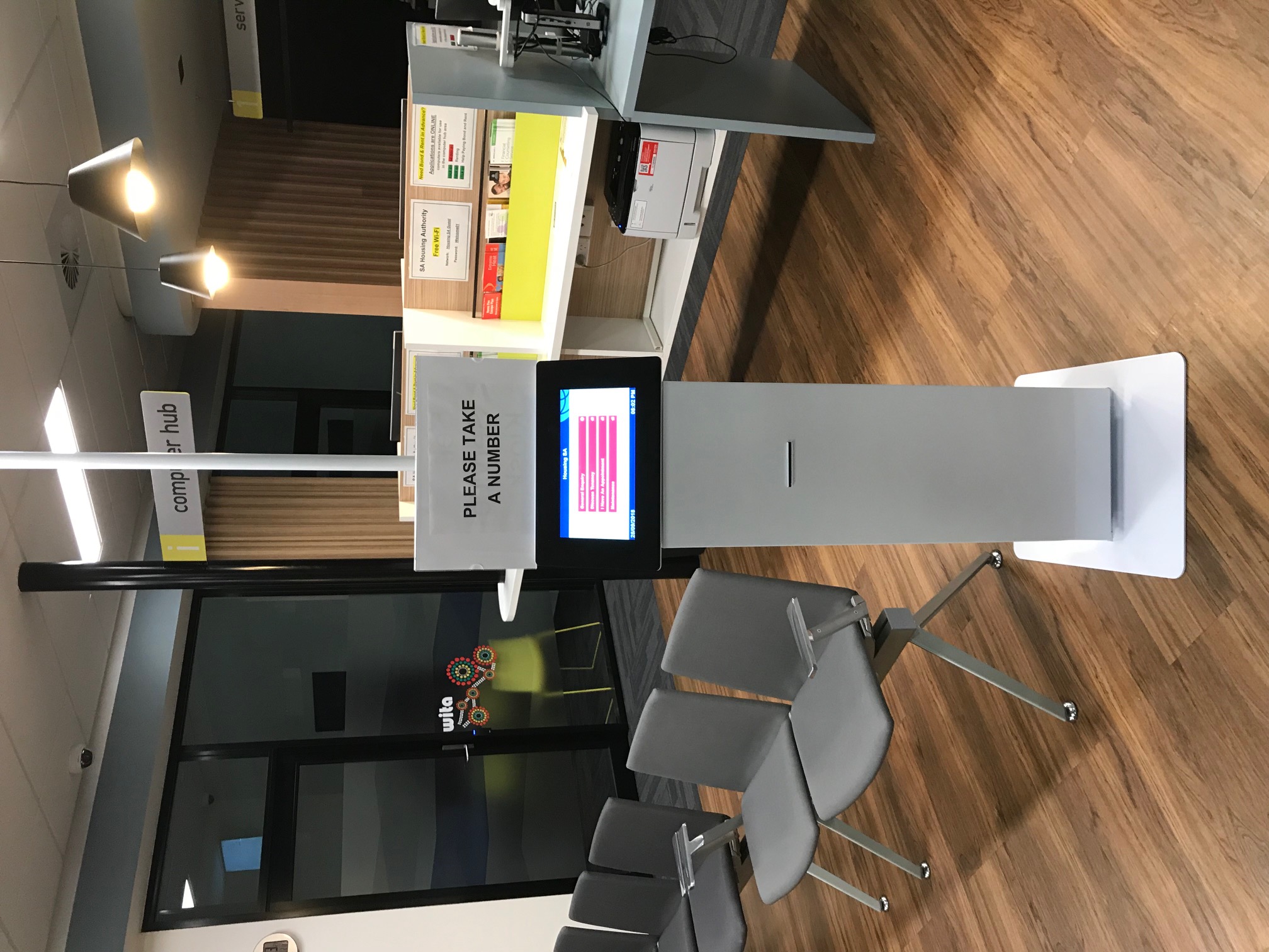 QRight self-service ticket kiosk in a Housing SA office